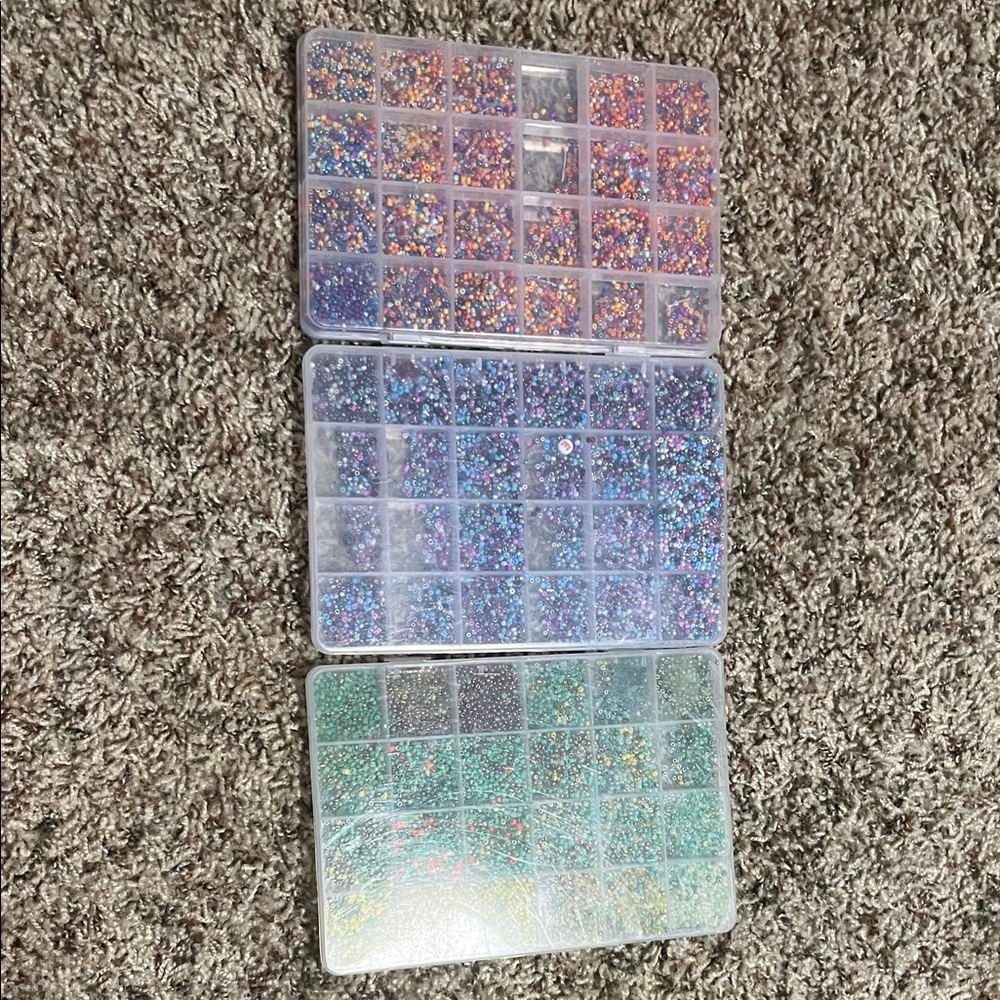 3 boxes of mini beads for bracelet making.